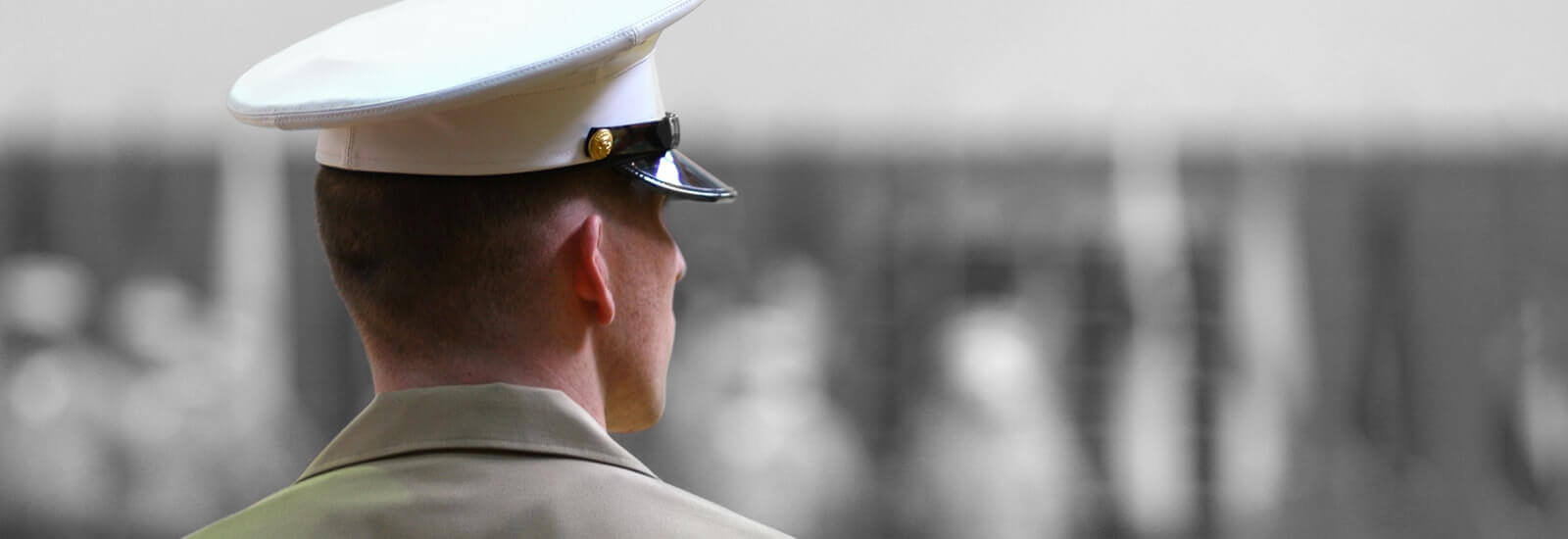 US Soldier standing and looking out into the distance