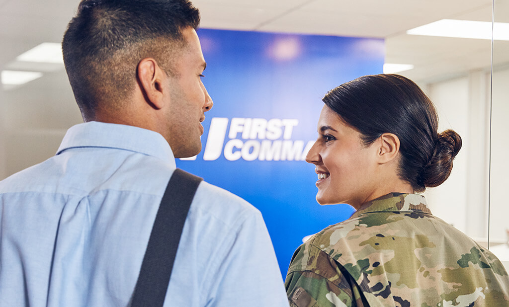 A soldier and their spouse walking into a First Command bank